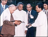 With honorable Prime Minister P.V.Narasimha Rao At the time of receiving "National Award" 