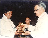 Receiving "State Award" from honorable Governor Kurshid Allam Khan 